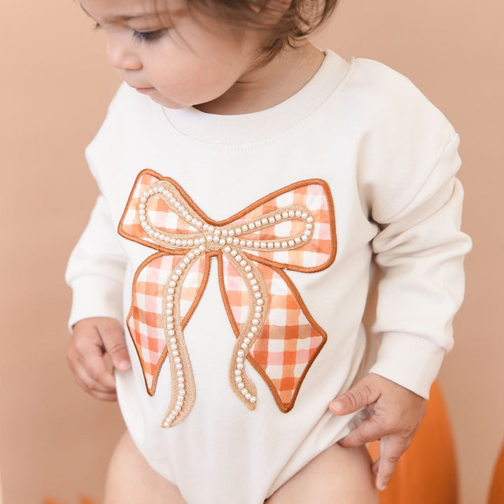 Cinnamon Plaid Bow Patch Long Sleeve Romper