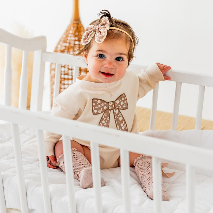 Mocha Floral Bow Patch Long Sleeve Romper