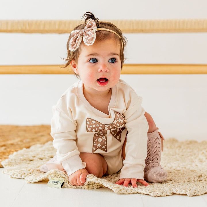 Mocha Floral Bow Patch Long Sleeve Romper